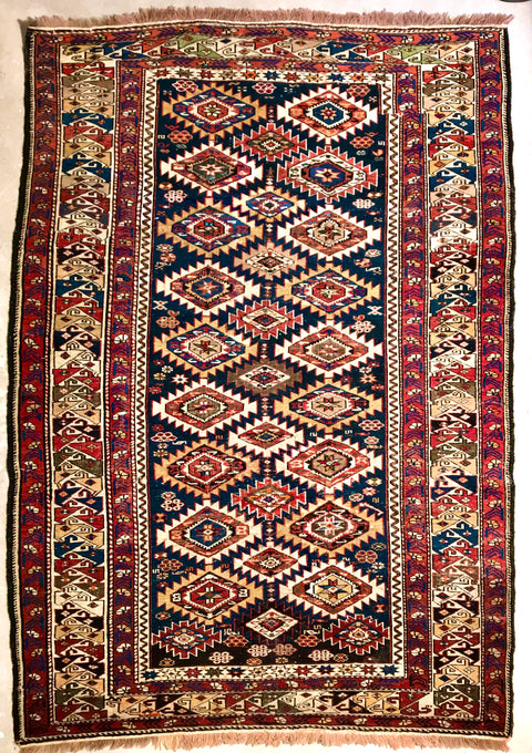 Colorful geometric tribal looking Russian Caucasian Shirvan rug