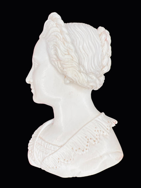 A CARVED PROFILE PORTRAIT RELIEF OF A LADY