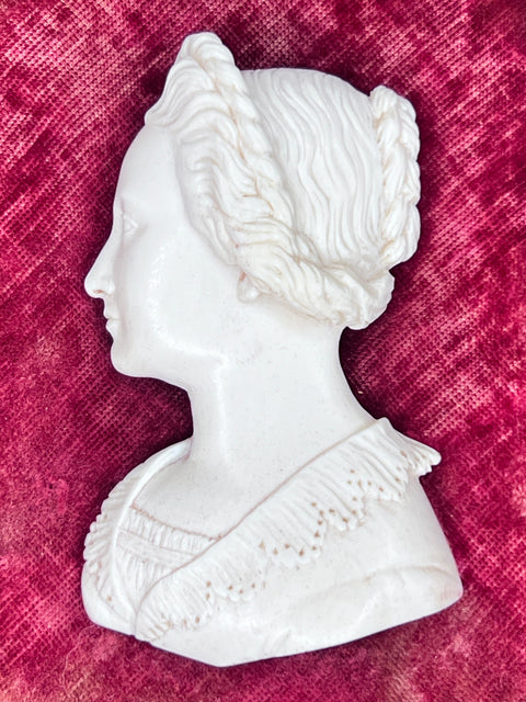 A CARVED PROFILE PORTRAIT RELIEF OF A LADY