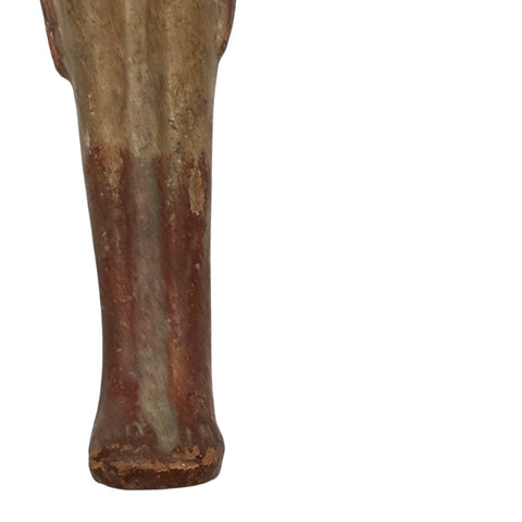 AN EGYPTIAN TERRACOTTA FEMALE FIGURE