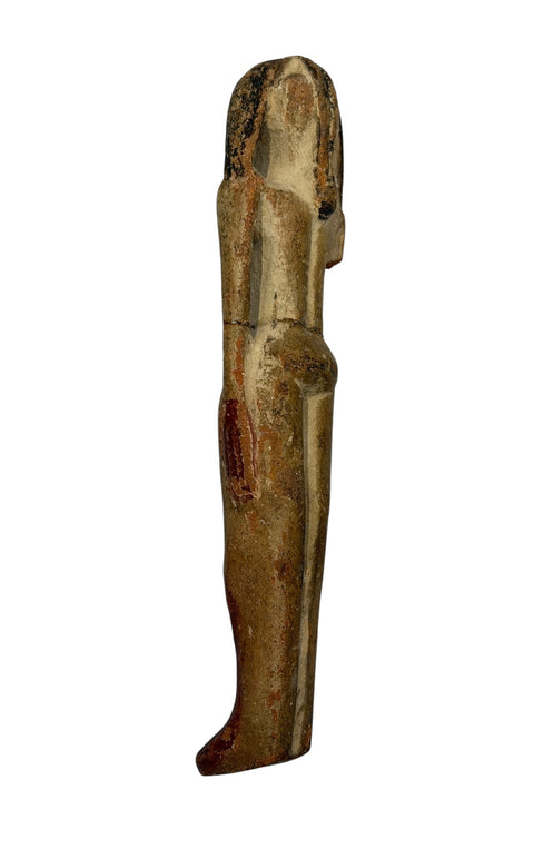 AN EGYPTIAN TERRACOTTA FEMALE FIGURE