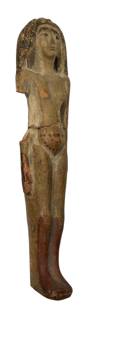 AN EGYPTIAN TERRACOTTA FEMALE FIGURE