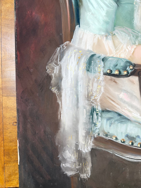 Close-up of an oil painting depicting a figure draped in white and pale blue fabric, seated on a dark wooden chair with gold nailhead details, next to a wooden floor.
